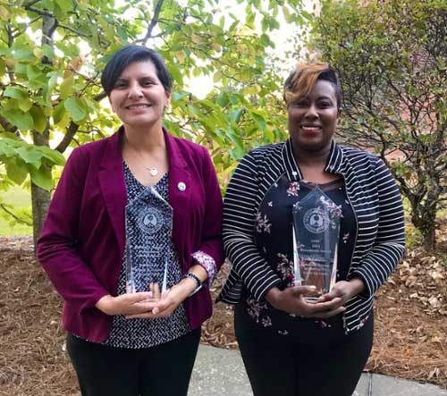 Jasmine Brown and Nancy Guyse holding their awards from the Georgia Society for Respiratory Care (GSRC) Summer Symposium.